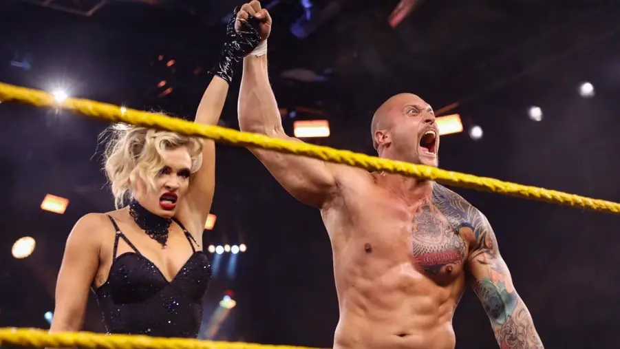 Karrion kross celebrates with scarlett on his wwe nxt debut may 2020